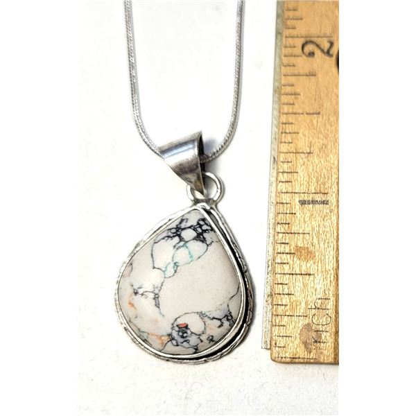 23)  PEAR SHAPED NATURAL BEZEL SET WHITE