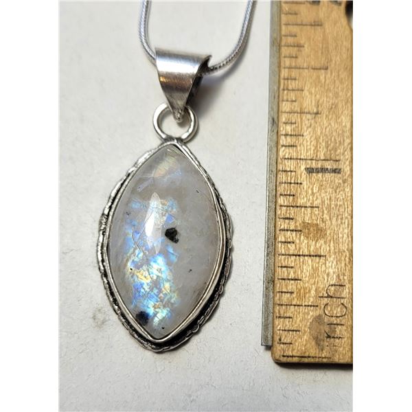 22)  NATURAL DIAMOND SHAPED, BEZEL SET