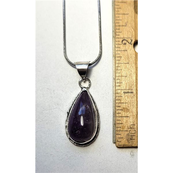 26)  NATURAL PEAR SHAPED, BEZEL SET DEEP
