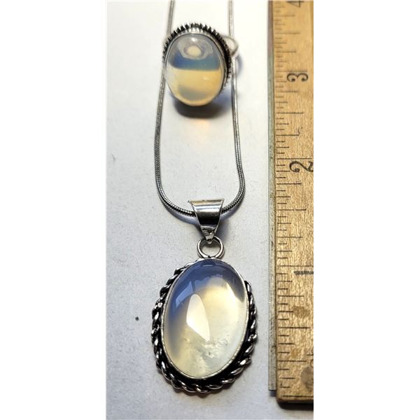 25)  SET OF SIZE 6.5 OVAL, BEZEL SET NATURAL