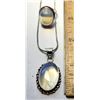 Image 1 : 25)  SET OF SIZE 6.5 OVAL, BEZEL SET NATURAL