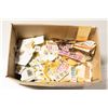 Image 1 : BOX OF OLD CANADIAN AND WORLD STAMPS ON PAPER