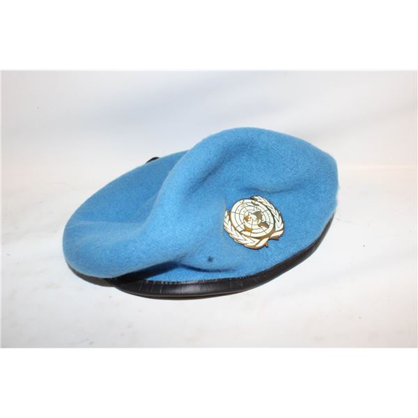 UN BLUE BERET WITH CAP BADGE SIZE 6 3/4