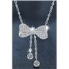 Image 1 : GRA CERTIFIED TASSEL BOW DESIGN ROUND BRILLIANT