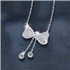 Image 3 : GRA CERTIFIED TASSEL BOW DESIGN ROUND BRILLIANT