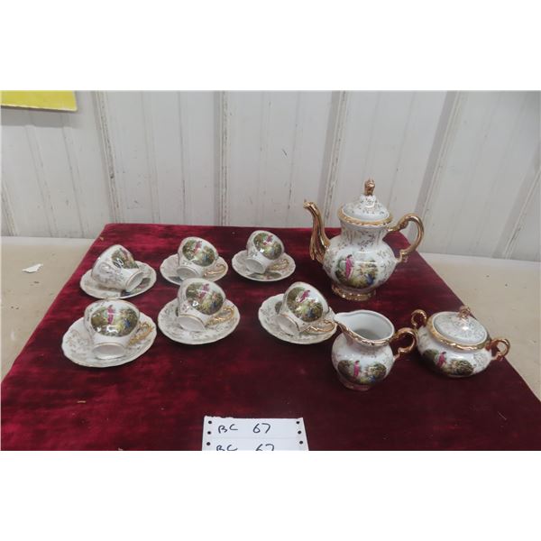 Limoges Style Tea Set Made in Japan with Teapot, Cream and Sugar, and Six Cups and Saucers