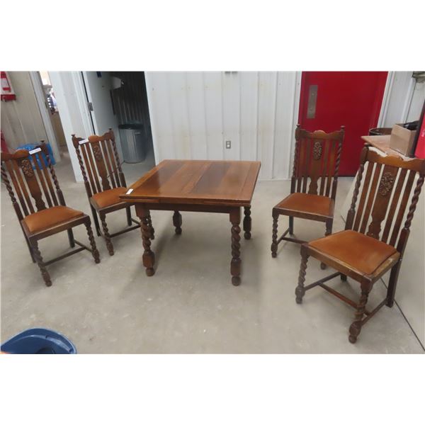 Jacobean Style Oak Dining Table with Two 12" Pull-Out Leaves and Four Matching Oak Chairs
