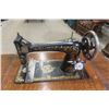Image 2 : Antique Singer Treadle Sewing Machine in Ornate Wooden Cabinet