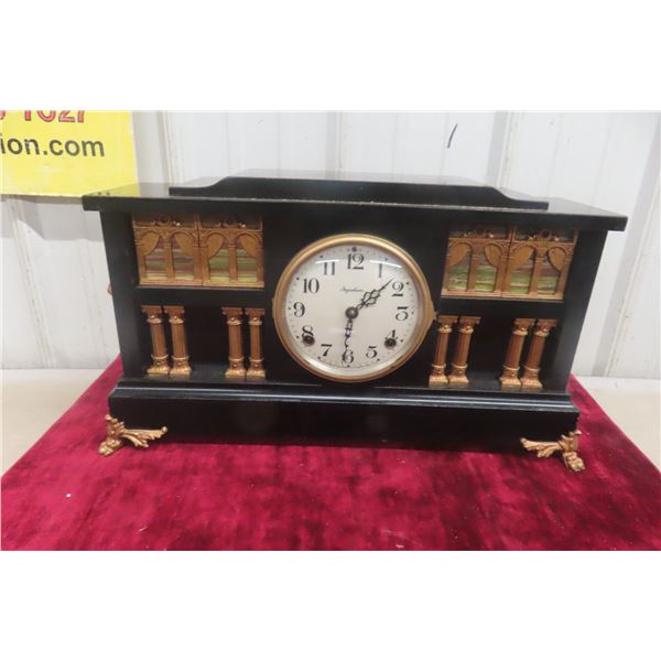 Antique E. Ingraham Black Mantel Clock With Gilt Classical Columns and Lion Mask Handles