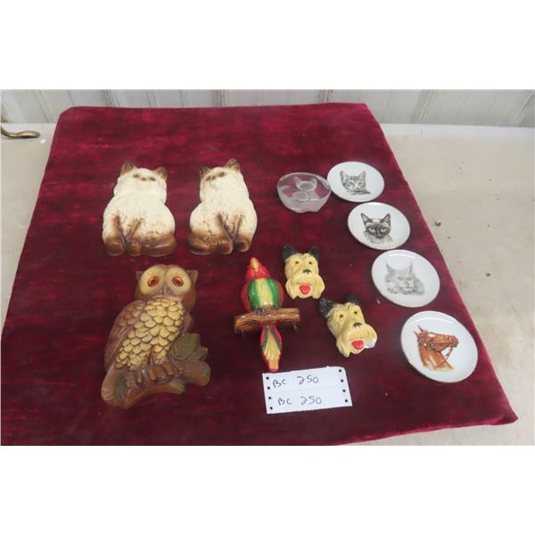 Assorted Chalkware Animal Figures Including Cats, Owl, and Dogs with Plates and Cut Glass Cats