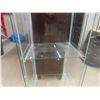 Image 6 : Glass Display Case With Three Glass Shelves Measuring 63 1/2" x 14 1/2" x 16 3/4"
