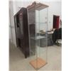 Image 2 : Glass Display Case With Three Glass Shelves Measuring 63 1/2" x 14 1/2" x 16 3/4"