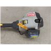 Image 2 : Ryobi Gas-Powered Weed Trimmer With String Head and Blade