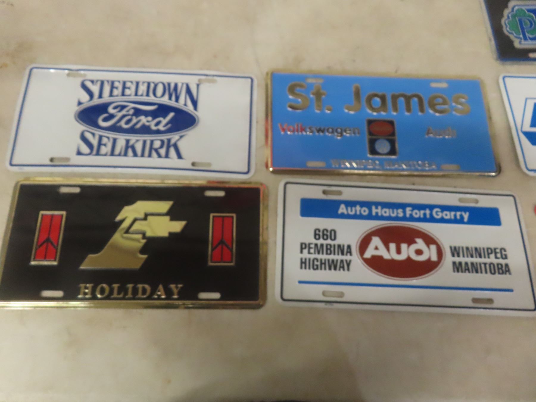 License Plate Emblems Assorted License Plates and Chrome Auto Emblems