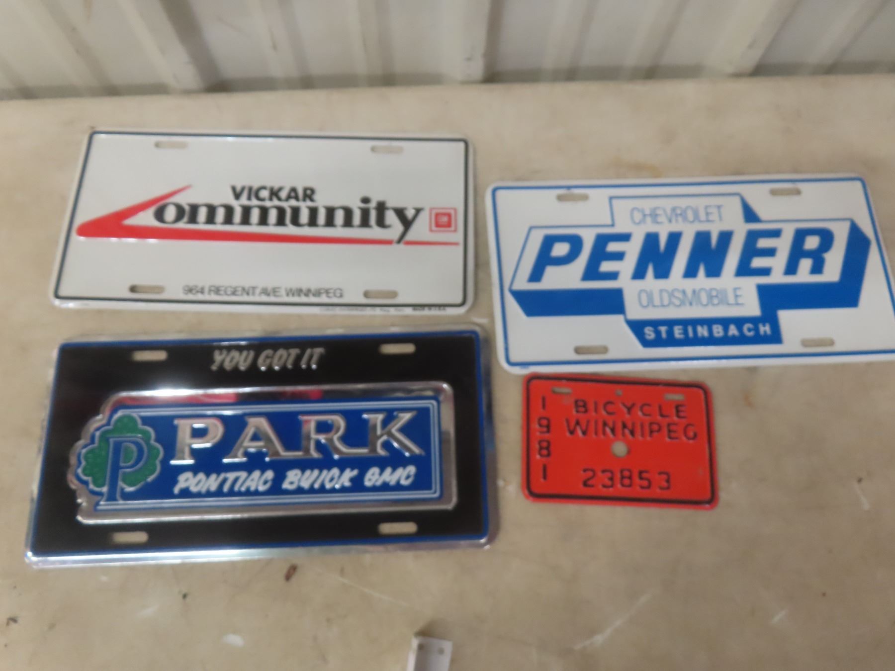 License Plate Emblems Assorted License Plates and Chrome Auto Emblems - McSherry Auction ...