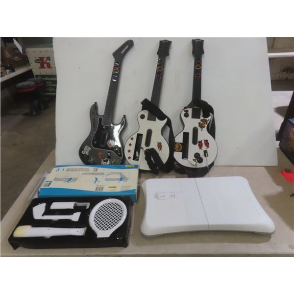 Wii Accessories Including Three Guitar Hero Controllers, Sports Kit, and Balance Board