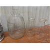 Image 7 : Four Oil Lamps, Lantern, Extra Chimneys, and Glass Jug