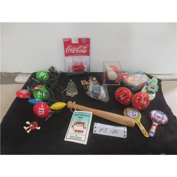Coca-Cola Die-Cast Vehicle, M&M Lights, McDonald’s Toy, Pepsi Watch, and Bird Snake Bat