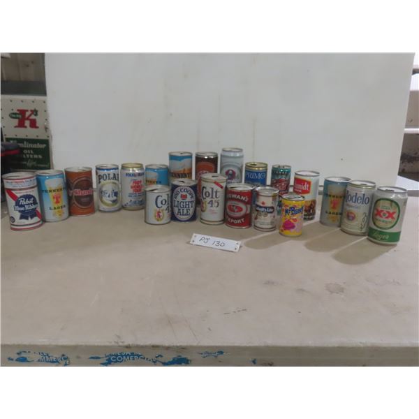 Twenty-One Cans of Soda and Beer Including Newcastle, Polar Shandy, Tennents, Colt 45, and More