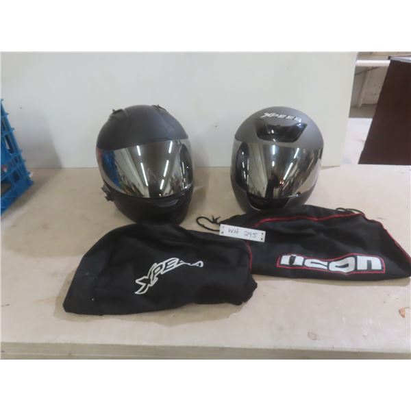 Two Motorcycle Helmets (One Large, One Small)