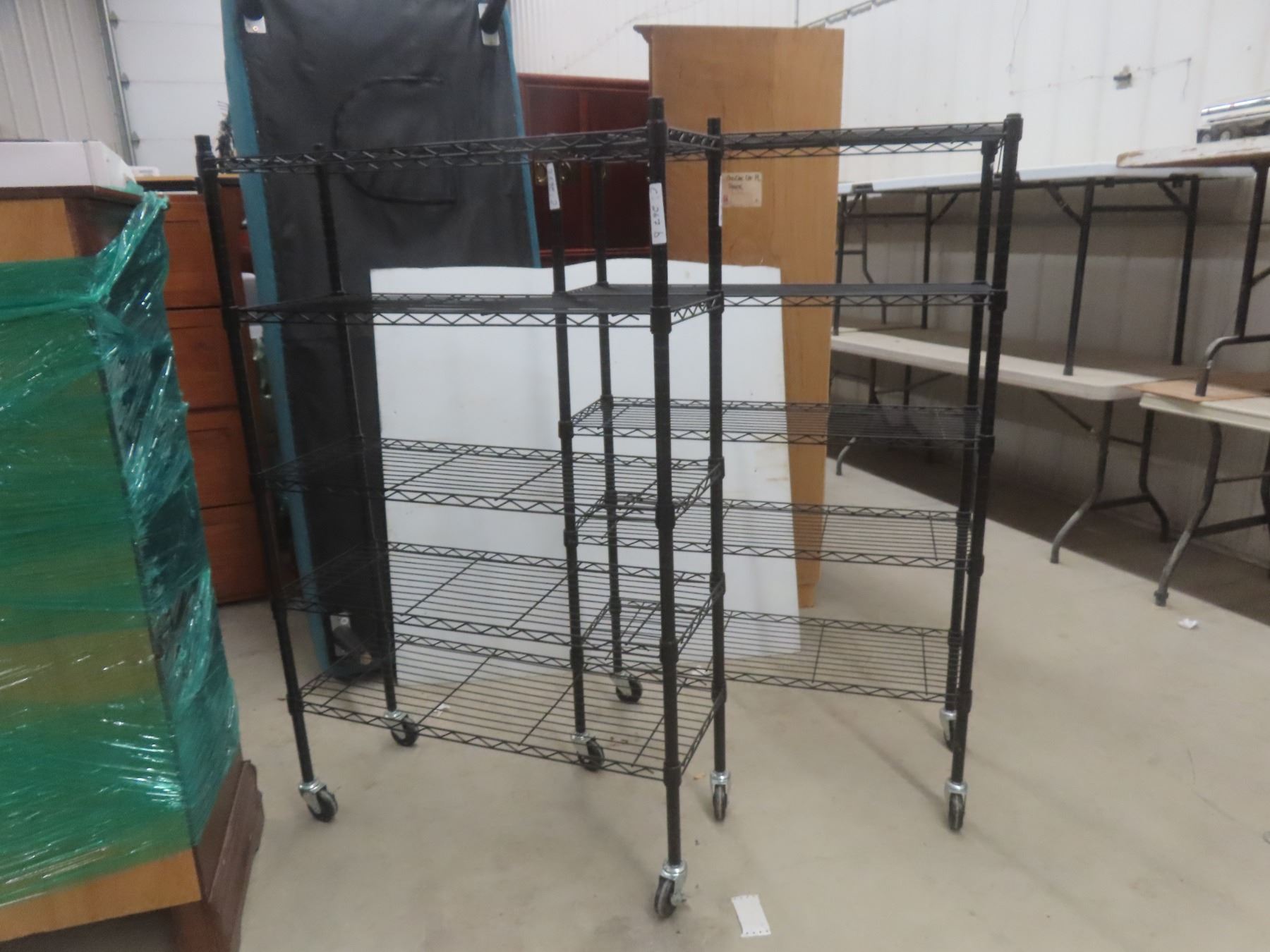 Two Rollable Four-Tier Shelving Units
