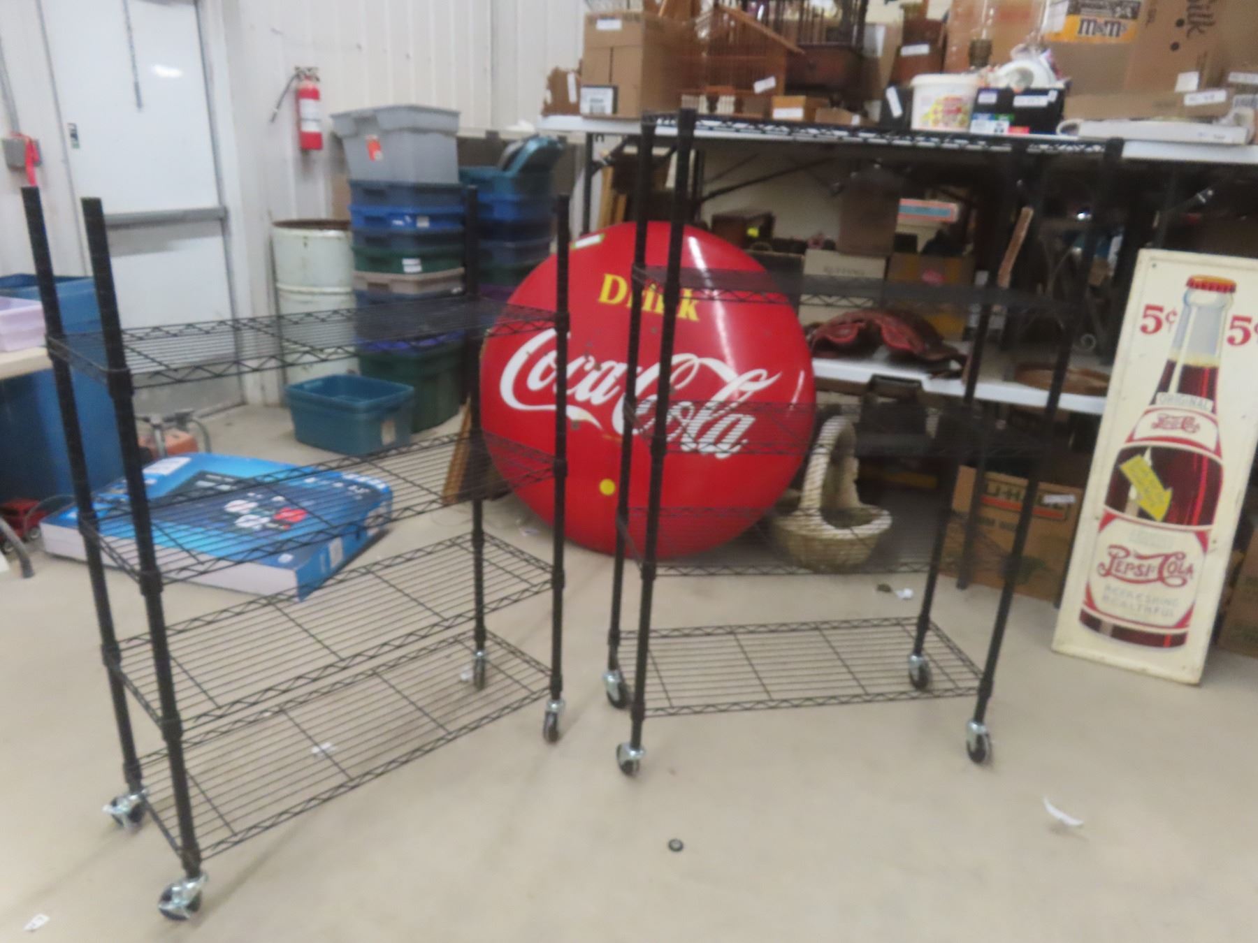 Two Rollable Shelving Units With 5 and 4 Tiers