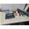 Image 1 : Car Windshield Shade, New Maglite Flashlight, Mastercraft Binder Full of Sandpaper, Two Spark Plugs
