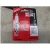 Image 7 : Car Windshield Shade, New Maglite Flashlight, Mastercraft Binder Full of Sandpaper, Two Spark Plugs