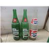 Image 3 : Twelve Soda Bottles With Plastic Carriers Including Coke, 7-Up, and Pepsi