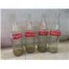 Image 4 : Twelve Soda Bottles With Plastic Carriers Including Coke, 7-Up, and Pepsi