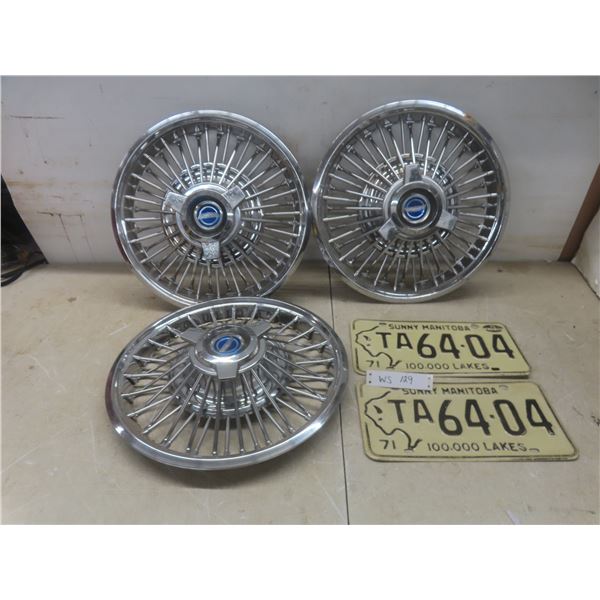 Three Chrome Ford Hubcaps and Two Manitoba 1971 License Plates