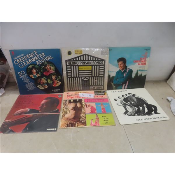 Six Albums Including CCR, Elvis Christmas Album, Prison Songs, and The Belly Dancer