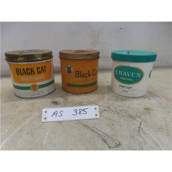 Three Tobacco Containers: Two Black Cat Metal and One Craven A Plastic