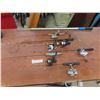 Image 1 : Six Ice Fishing Rods, Six Reels and Landing Net