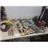 Image 1 : Husky Tool Bag Filled With Pulleys, Bungee Cords, Allen Keys, Wire, And Safety Glasses
