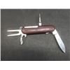 Image 8 : Collectibles: Police Badge, Multi-Use Knife, And Silver-Plated Spoon