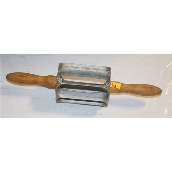 UNCLAIMED DOUGH ROLLER