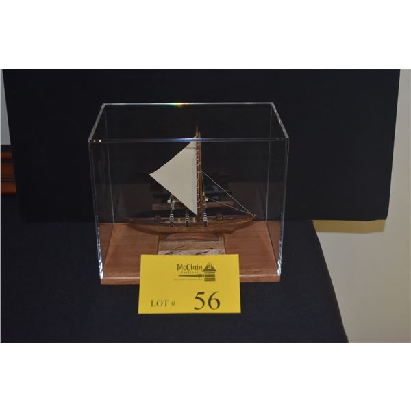 SMALL SAMOAN CANOE IN SHOWCASE