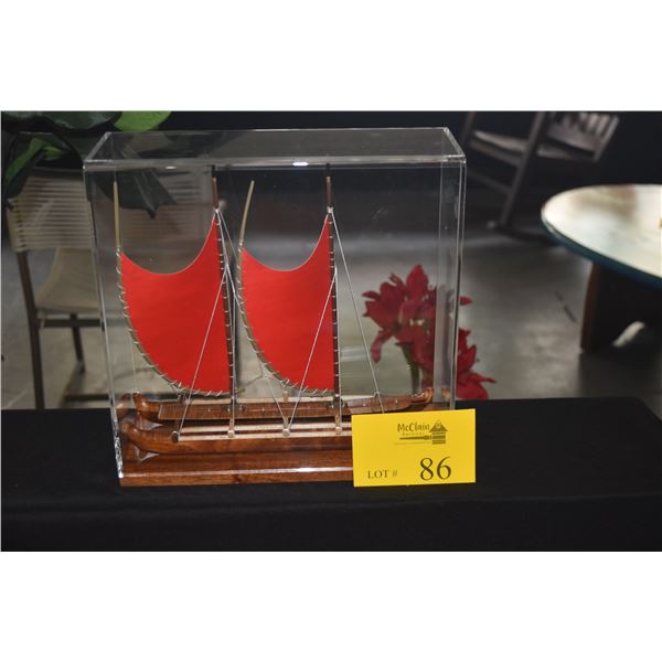 12" HAWAIIAN VOYAGING CANOE W/RED SAILS IN SHOWCASE BY FRANCIS PIMMEL