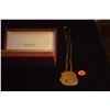 Image 1 : MING'S BROCADE NECKLACE W/CARVED "LUCKY" STONE PENDANT W/10K BALE; SIGNED W/MING'S BOX (27")