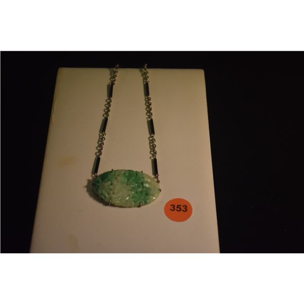 STERLING SILVER & CARVED JADE PENDANT