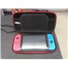 Image 9 : Nintendo Switch Game System With Charger, Case, Three Games, and Memory Card, Tested and Working