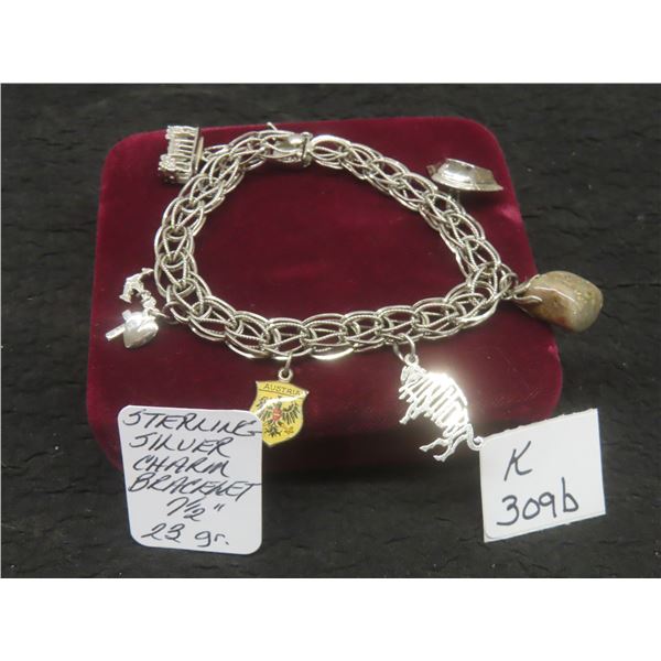 Sterling Silver Charm Bracelet With Six Charms Measuring 7 1/2", Total Weight 23 Grams