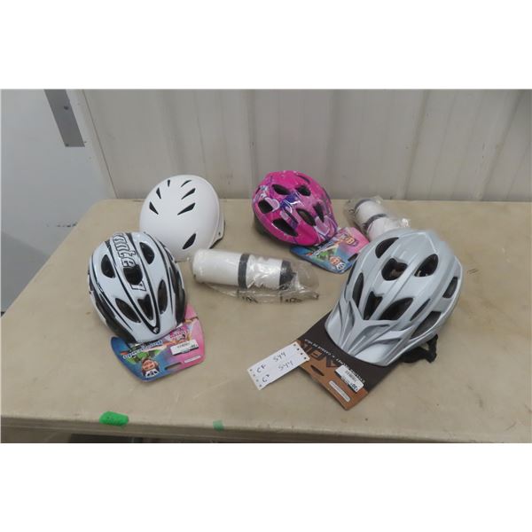 Four New Bicycle Helmets and Two New Water Bottles