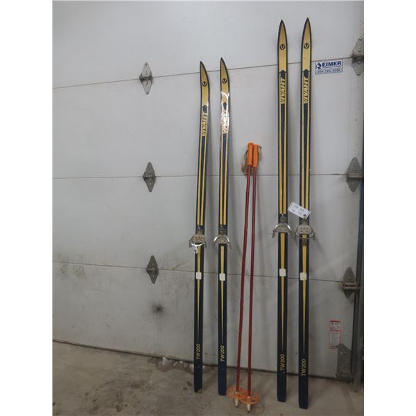 Two Sets of Vivant Skis, Sizes 210 cm and 195 cm, Plus One Set of Poles