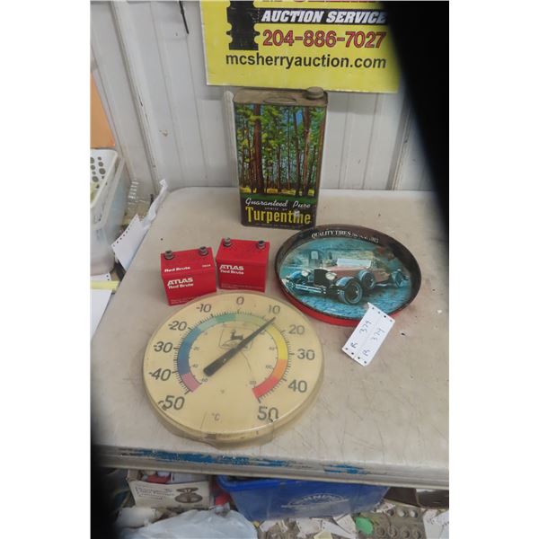 2 Atlas Red Brute Batteries, John Deere Thermometer (Cracked), 1 Gal Turpentine Tin, General Tire T