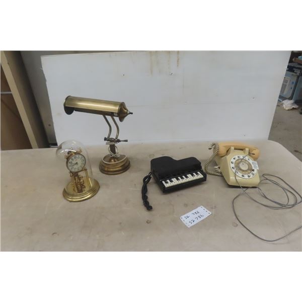 Rotary Telephone, Pianist Phone, Desk Lamp, and Anniversary Clock