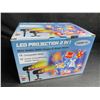 Image 1 : 1 LED Outdoor Motion Projector Light - Includes 18 Changeable Holiday Slides/Designs - New!