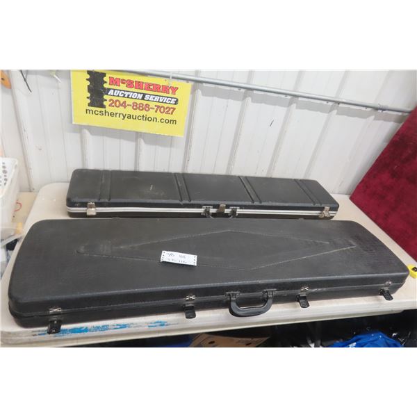 2 Hard Gun Cases Measuring 51'' x 13'' x 4 1/2'' and 48'' x 9 1/2'' x 4'' 