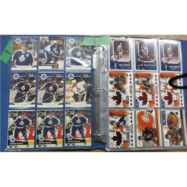 COLLECTABLE:  BINDER OF ASSORTED SPORTS CARDS